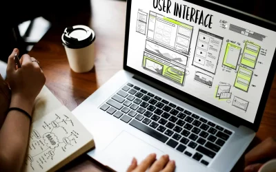 Reka bentuk user interface website dipaparkan pada komputer riba sebagai sebahagian daripada proses bina website perniagaan.